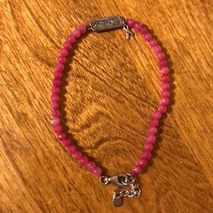 Silpada breast cancer bracelet.